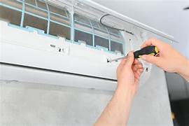 UAE-based AC repair team working on residential cooling system