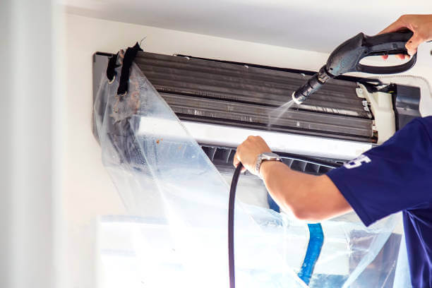 Is Your AC Making You Sick? | Get Professional AC Cleaning Dubai services Technician Cleaning AC in Dubai
