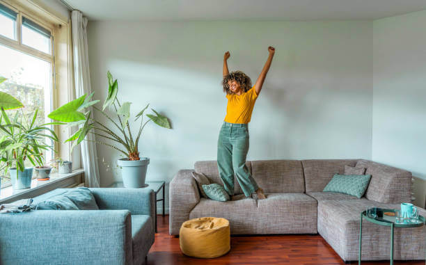Woman enjoying on a cleaning sofa