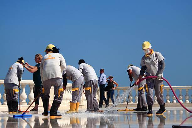 Top Reasons to Hire Home Cleaning Dubai Experts Today Full deep cleaning service being conducted at the Burj Khalifa, showcasing high-rise exterior and interior maintenance in Dubai’s tallest skyscraper.